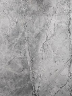 Textura de mármol Calacatta Blanc natural con vetas grises marcadas y fondo blanco, ideal para cubiertas y revestimientos premium