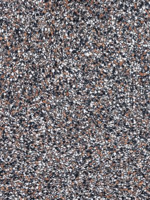 Detalle de superficie de terrazo Agglotech Multicolor Grigio con fragmentos blancos, negros y tonos terracota, ideal para cubiertas y revestimientos contemporáneos