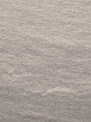 Superficie Wave Calais Santamargherita con textura ondulada en tono gris, ideal para cubiertas y revestimientos modernos